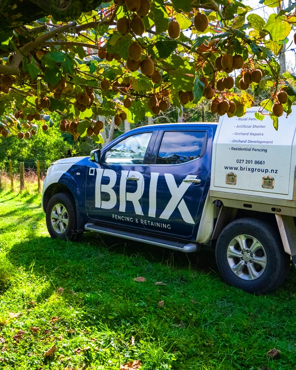 Brix group vehicle parked under canopy in Katikati orchard