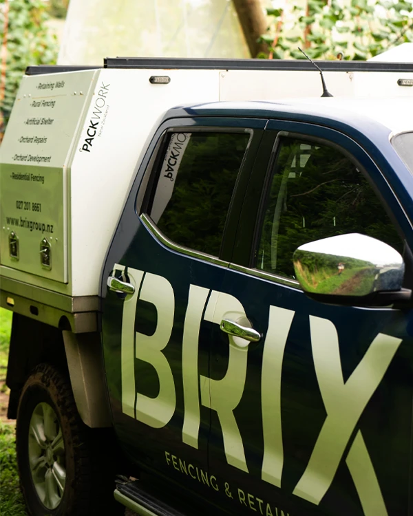 Brix Group ute parked amongst kiwifruit vines